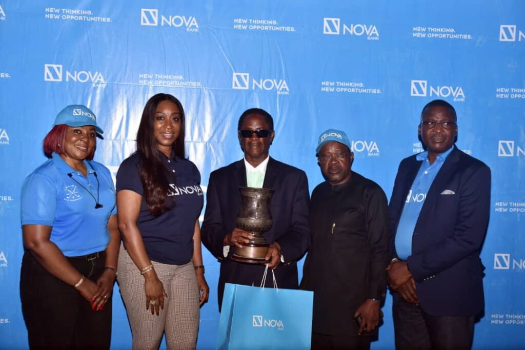 NOVA Bank executives with the Nigeria Cup 2024 Champion. Left to right: Esther Adino, Group Head, Retail and Digital Banking; Chinwe Iloghalu, Executive Director, Institutional and Commercial Banking; Tayo Babalakin, The Nigeria Cup 2024 Champion; Ede Osemwengie, Chairman, Nova MBL Asset Management; Dr. David ISIAVWE, Executive Director, Operations and IT